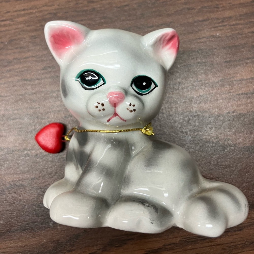 Russ ceramic gray cat with heart pillow